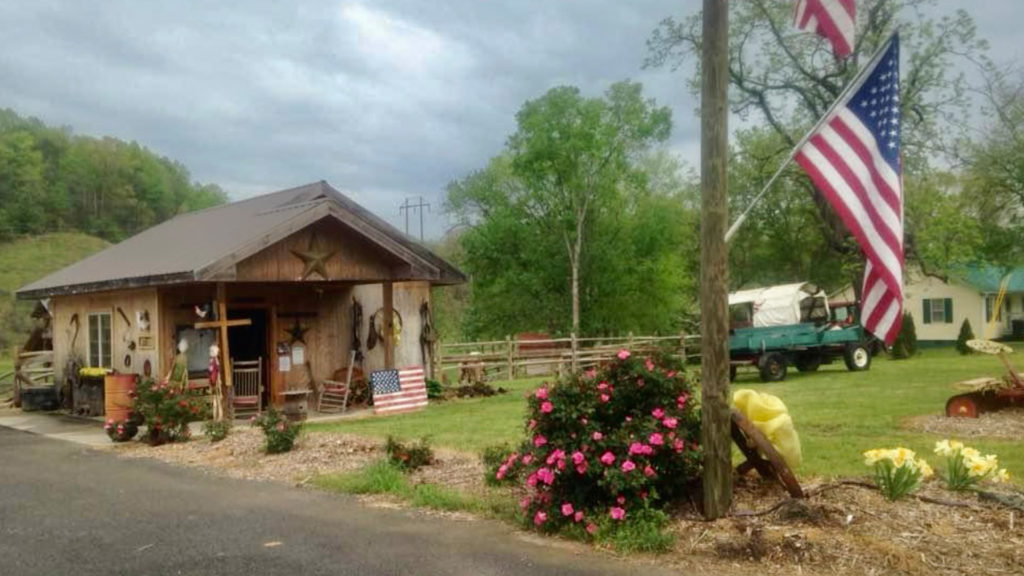 Goldrush Horserides – slide photo – building with flag